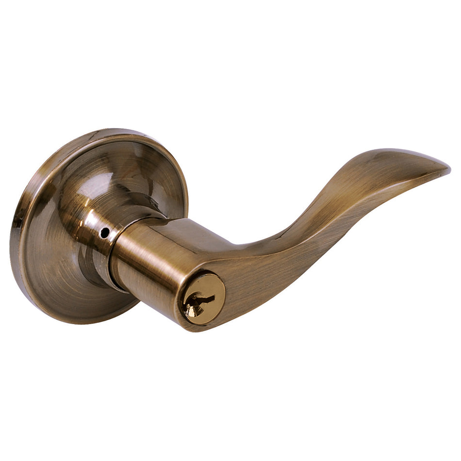 Manija tubular curva función entrada y recámara, latón antiguo, llave estándar, blíster Lock 20MA